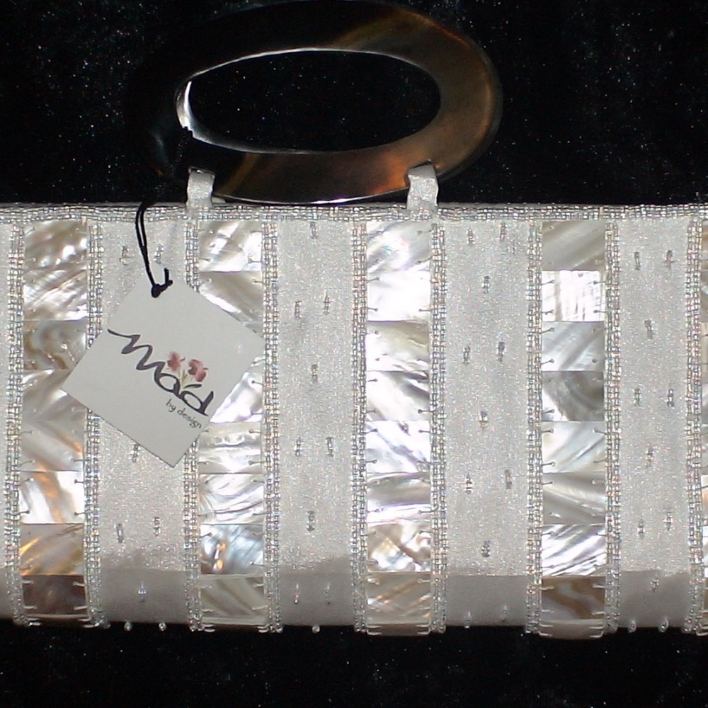 New with tags Mad by Design white clutch
